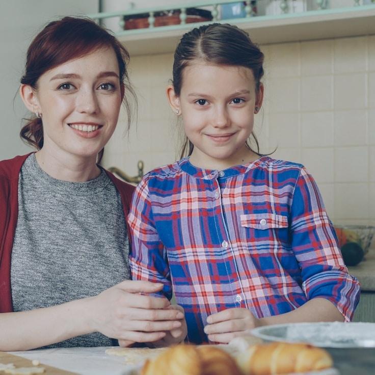 Kaveri Mehta, Lead Design Curator at CoveNestDistant, reviewing corporate floral arrangements